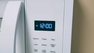microwave with blinking clock
